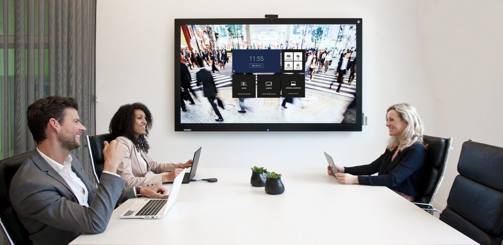 Bussiness Meeting with 3 people, A "Plug & Play" solution for the meeting room, your efficient and secure solution for meetings, be it at the joint conference table or with colleagues all over the world.